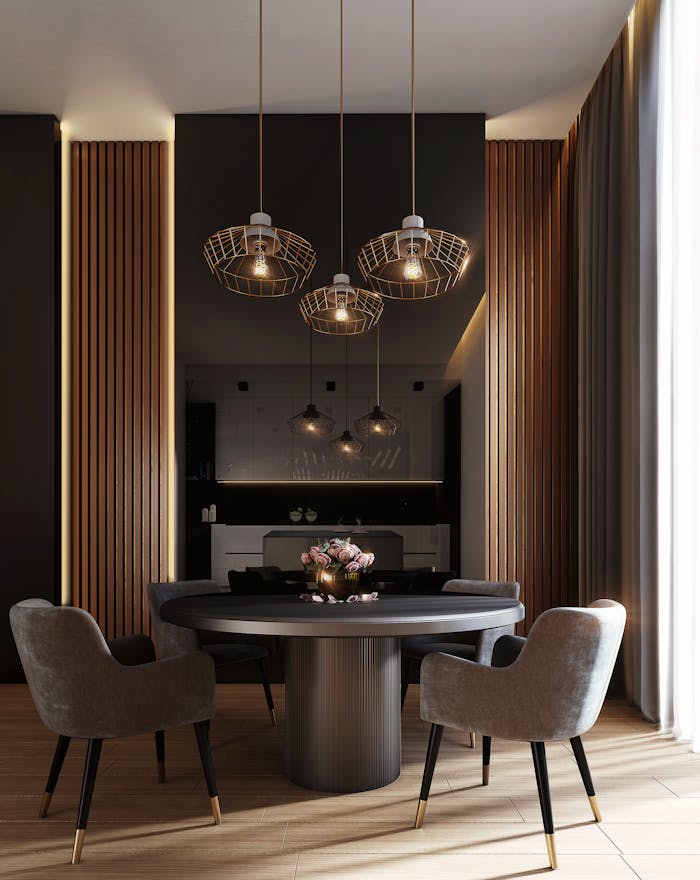 gray-dining-table-under-pendant-lamps-3356416 A sophisticated, contemporary dining room with elegant lighting and luxurious furnishings.